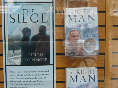 Bush book display next to poster for The Siege